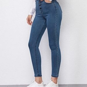 Button fly skinny jeans